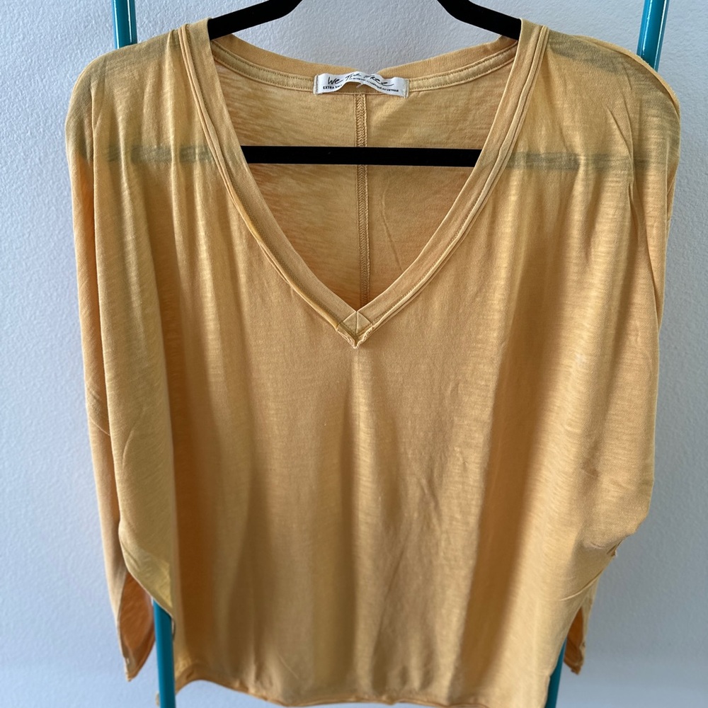 We The Free oversized long sleeve yellow t-shirt. New with tags.